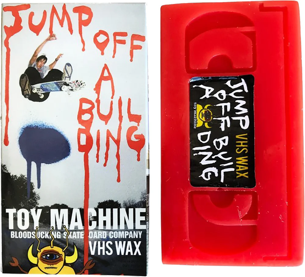 4515-toy-machine-vhs-wax-jump-off-a-building-red-1.webp Toy Machine VHS Wax Jump Off A Building - Red